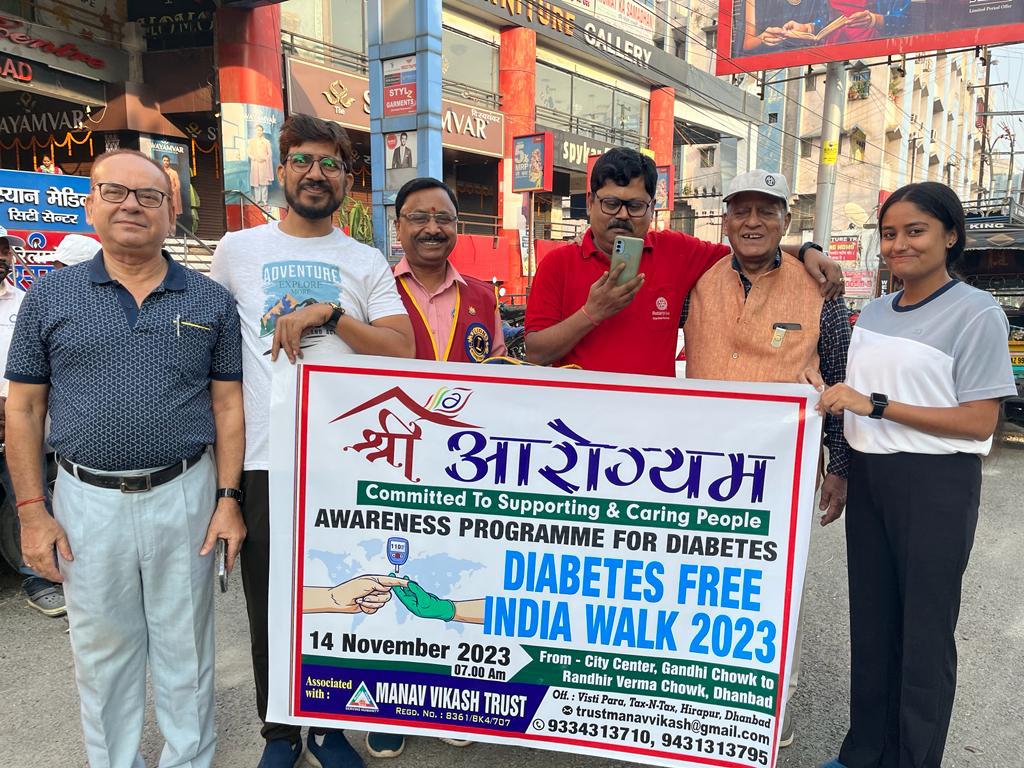 A photograph capturing a moment of community service and trust engagement.